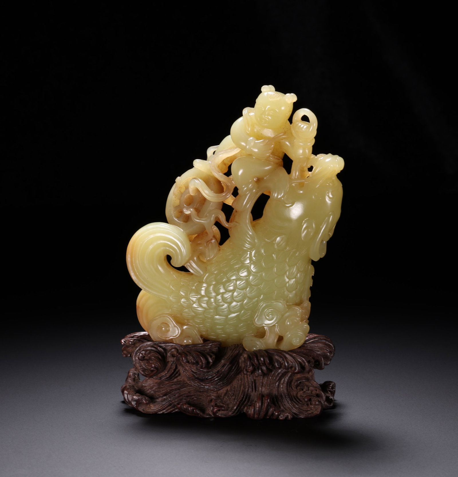 Qing Dynasty Yellow Jade Boy Playing with Fish Ornament: H. 12cm.W.7.2cm.weight.220grams