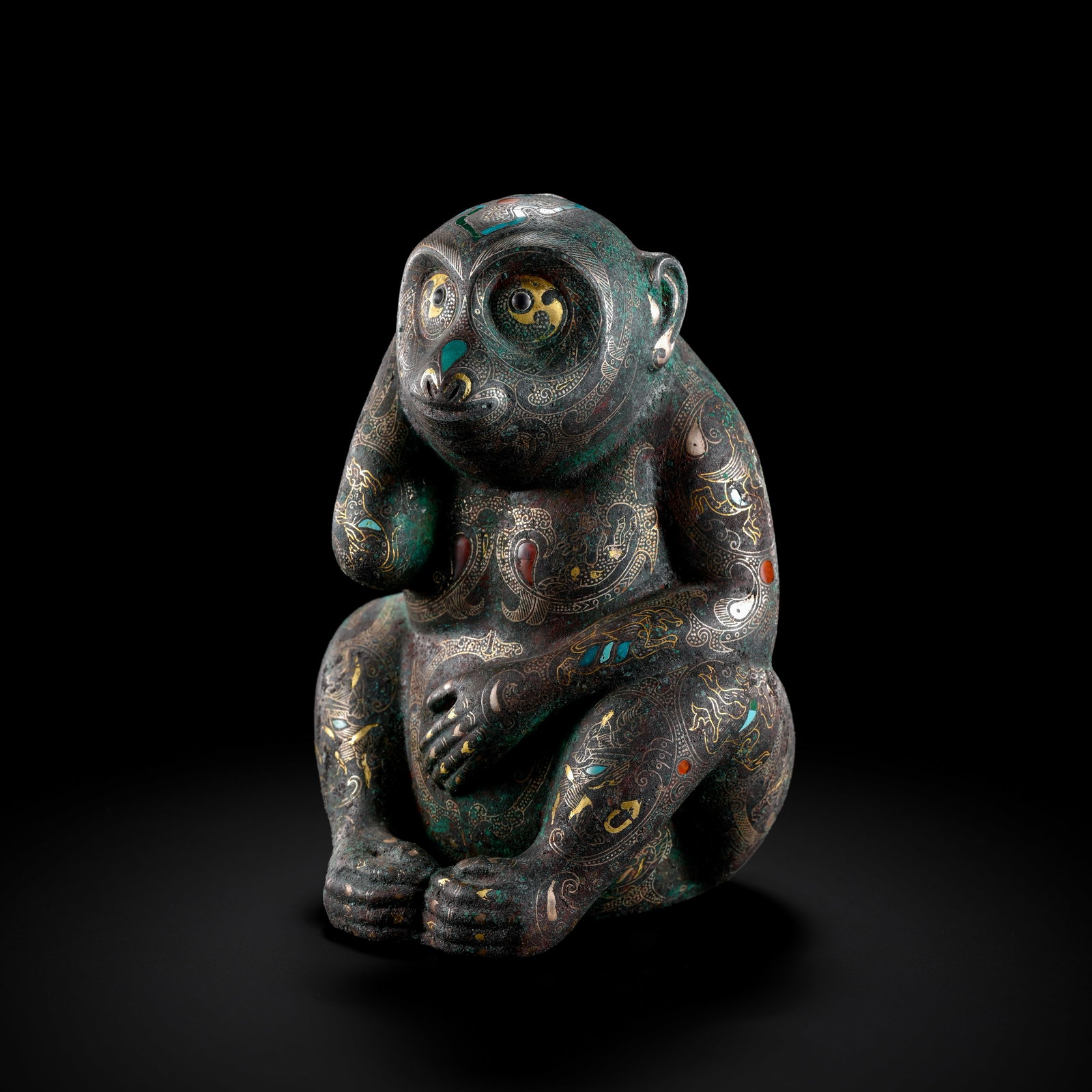 Pre-Ming Dynasty Gold and Silver Inlaid Gem-Set Seated Monkey: H. 14cm.W.9cm.weight.820grams