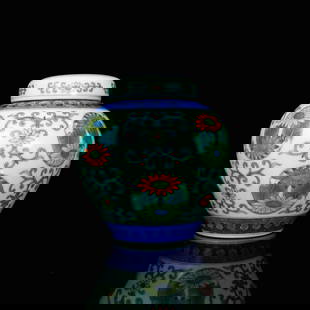 Qing, Qianlong Doucai Floral Jar and Cover: H: 12.9cm | Belly Diam.: 7.5cmMark: "Qianlong Reign"Contrasting-color chrysanthemum medallions. Small jars appear in The Qianlong Emperor??s Snow Pleasures palace paintings as tea accoutrements.