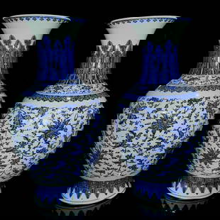 A pair of large blue and white flower vases with intertwined lotus patterns: Height: 87cm Abdominal diameter: 41cmThe vase is large in shape, well preserved, and the body is thick and steady. The whole body is coated with white glaze, and the blue and white painting on the out