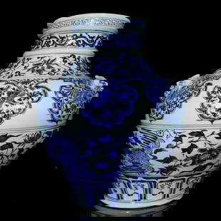 Yuan Dynasty, Blue-and-White Phoenix-and-Peony Jar with Beast-Mask Handles: Dimensions: H: 40 cm; Belly diameter: 35 cmA fusion of Han and nomadic aesthetics, this olive-shaped jar features six layered bands of cobalt motifs: scrolling foliage, peonies, flying geese, and phoe