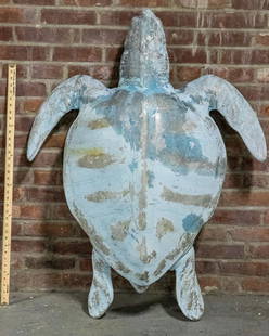 Oversized Metal Sea Tortoise Decorative Garden Object: Oversized decorative metal sea tortoise with weathered patina. Please note of wear consistent with age and exposure to the elements. The piece measures 49"W x 39"D x 19"H.