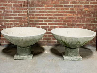 Pair of Mid-Century Modern Style Planters: Pair of Mid-Century Modern planters on pedestal bases. The planters are connected by cement to the bases. Please note of wear consistent with age including patina. The planter measures 32"DIA x 20.50"