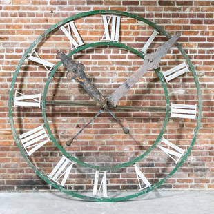 Late 19th Century Large French Iron Clock Face: Late 19th century large French iron clock face with roman numerals. Both minute and hour hands are still intact. Please note of wear consistent with age including oxidation and patina to the metal due