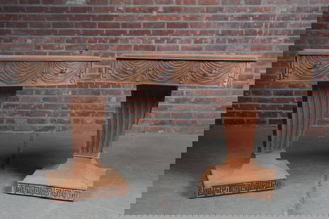 Pair of Grosfeld House Hollywood Regency End Tables: A pair of Hollywood Regency style end tables from Grosfeld House, a prominent New York based furniture company. Single piece tops with beveled edges above drapery motif aprons and drawer faces with tw