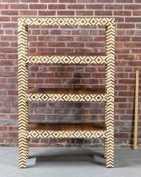 Four Tier Teak Wood Etagere with Inlaid Camel Bone Marquetry: Four tier teak wood etagere inlaid with camel bone marquetry trim on block turned feet. The piece is accented by lozenge shaped horizontal inlay and chevron shaped vertical inlay. Please note of wear 