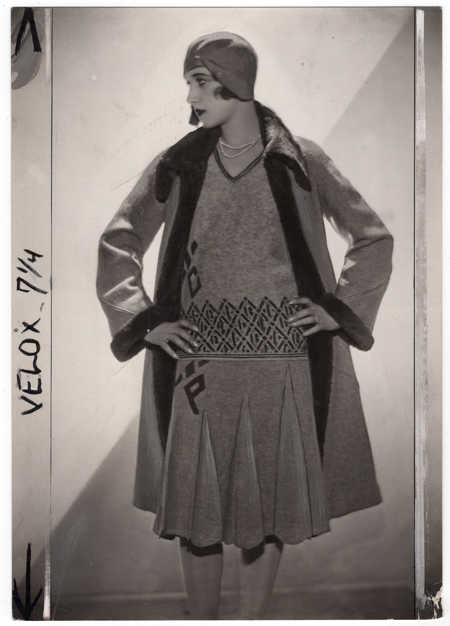 Egidio Scaioni* (Milan 1894 - 1966 Paris): Egidio Scaioni* (Milan 1894 - 1966 Paris) Model wearing Premet fashion travelling ensemble, 1928 vintage gelatin silver print 22,5 x 15,9 cm verso photographer’s stamp Lower right corner bumped, ret