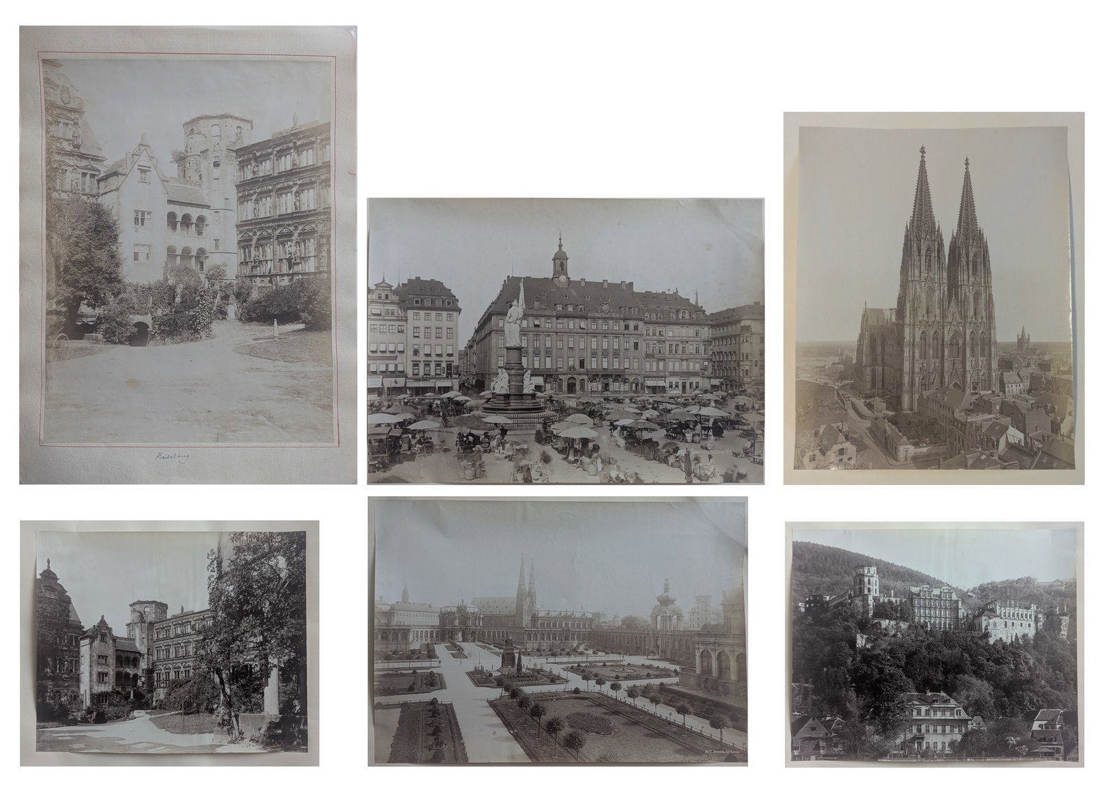 Unknown photographer (Biographical data unknown): Unknown photographer (Biographical data unknown) Bundle of 6 photos of Germany, ca 1880 albumen prints Heidelberg 33,5 x 26 cm Dresden Altmarkt 20,5 x 28 cm blindstamp „Tamme“ alle auf Papier