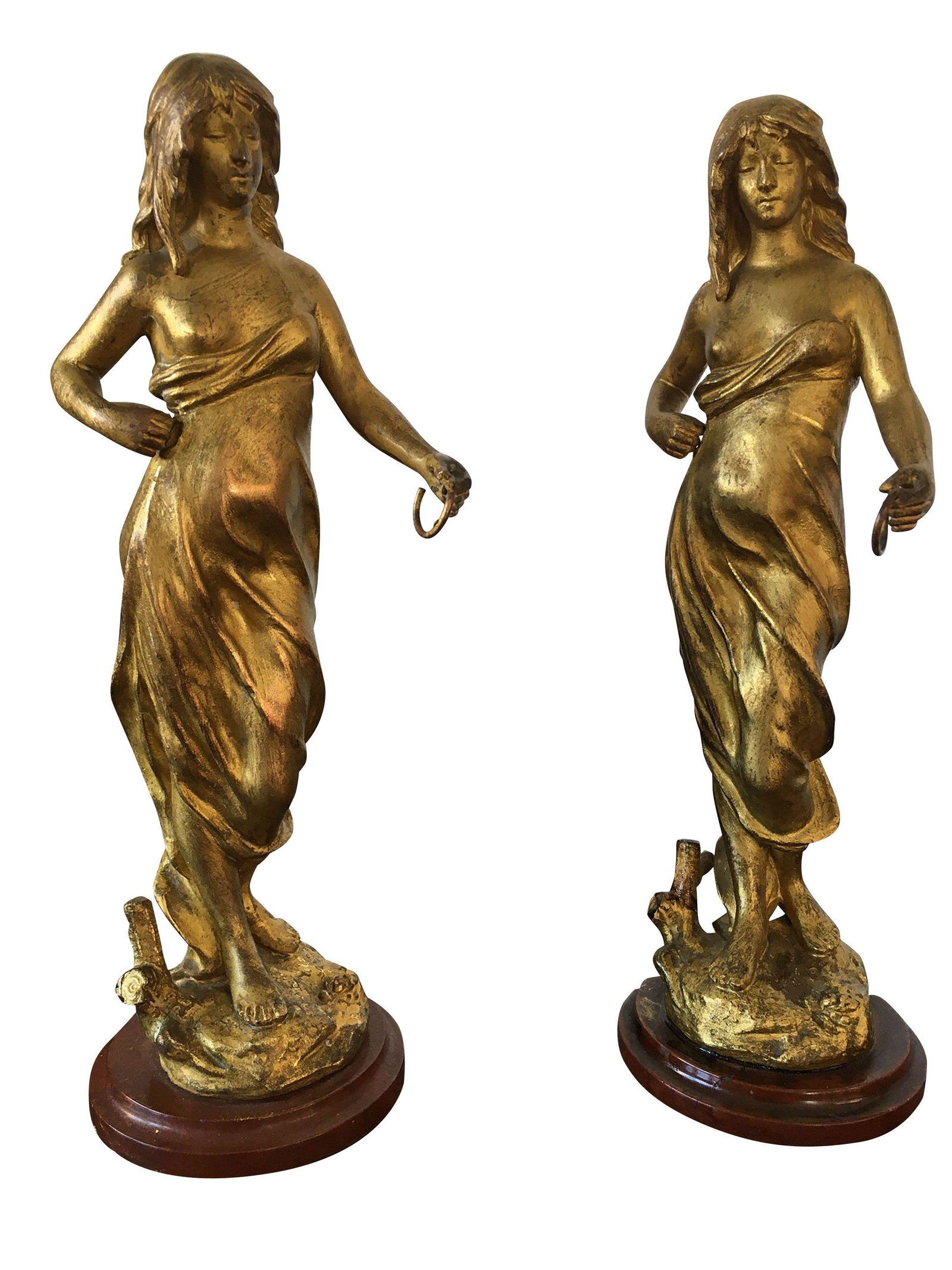 EARLY 20TH CENTURY FRENCH - SET OF 2 BRONZE SCULPTURES OF PRINCESSES WITH BARE TORSO - SIGNED J.: Description: At the beginning of the 20th century, the sculpture of these two bare-chested princesses in gilt metal were produced and signed by the Frenchman J. Garnier on the base, representing a pre