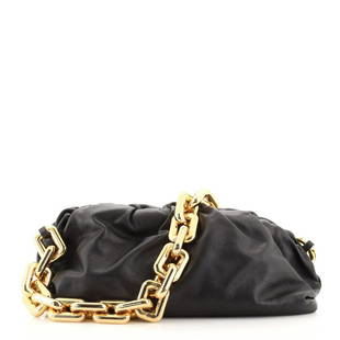 Bottega Veneta The Chain Pouch Leather: These are professional pictures of the actual item offered by Rebag. Condition: Great. Light wear and creasing on exterior and in interior, minor splitting on handle base trim wax edges, scratches on