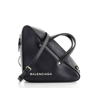 Balenciaga Triangle Duffle Bag Leather Small: These are professional pictures of the actual item offered by Rebag. $2,050 Condition: Very good. Minor scuffs and creasing on exterior, creasing and light wear interior, scratches on hardware.