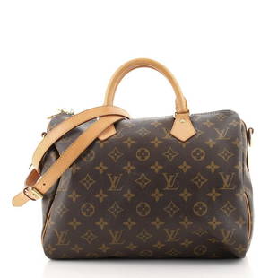 Louis Vuitton Speedy Bandouliere Bag Monogram Canvas 30: These are professional pictures of the actual item offered by Rebag. Condition: Fair. Odor in interior. Wear on base corners, heavy darkening, wear, scuffs and water stains on leather trims, handles