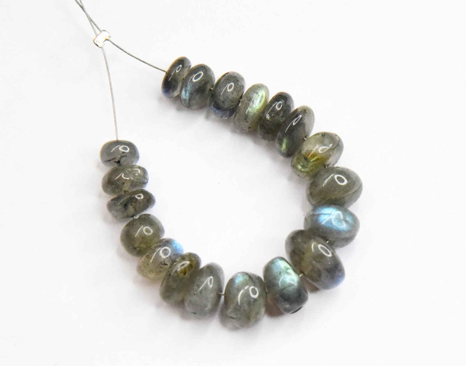 NATURAL LABRADORITE BEADS RONDELLE 6 - 11 MM 19 PCS: These are natural, earth mined and hand crafted with precision. Stone: Labradorite, Stone Shape: Rondelle, Stone Size: 6 - 11 mm, Width: 3 - 6 mm, Weight: approx. 45 carats. The photographs are genera