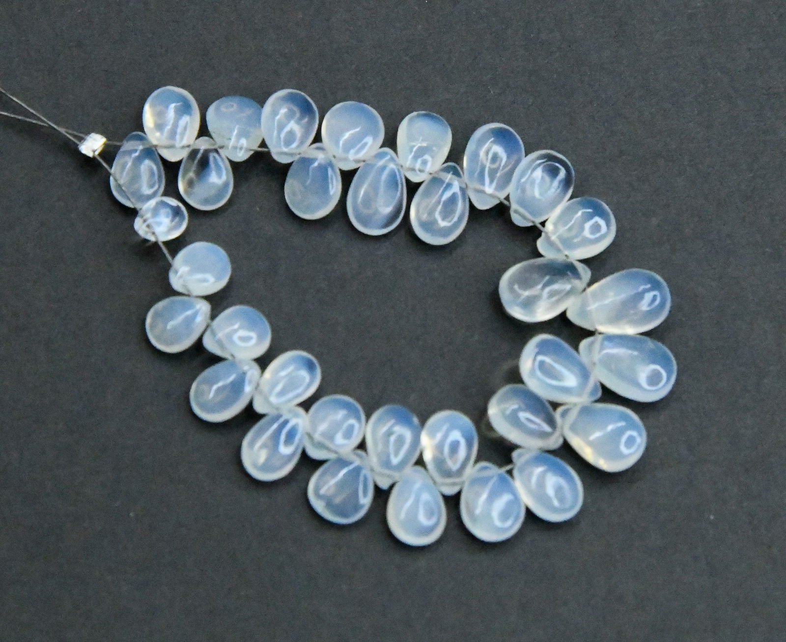NATURAL OPALITE BEADS PEAR 4X6 - 6X9 MM, 33 PCS  (1 TASSEL) (1 of 1)