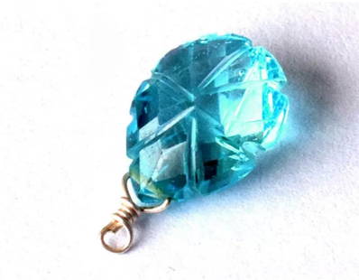 NATURAL SWISS BLUE TOPAZ BEAD CARVED PEAR 9X12 MM SOLID 925 SILVER 1 PC: These are natural, earth mined and hand crafted with precision. Stone: Blue Topaz, Shape: Faceted/Carved Pear, Size: 9x12mm, Width - 5 - 6mm, Weight: approx. 4.80 carats. The photographs are enlarged