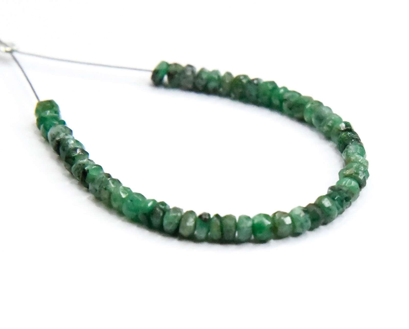 NATURAL EMERALD BEADS FACETED RONDELLE 2.5 - 3 MM, 51 PCS (1 TASSEL): These are natural, earth mined and hand crafted with precision. Stone: Emerald, Stone Shape: Faceted Rondelle, Stone Size: 2.5 - 3 mm, Width: 1 - 2 mm, Weight: approx. 6 carats. The photographs are ge