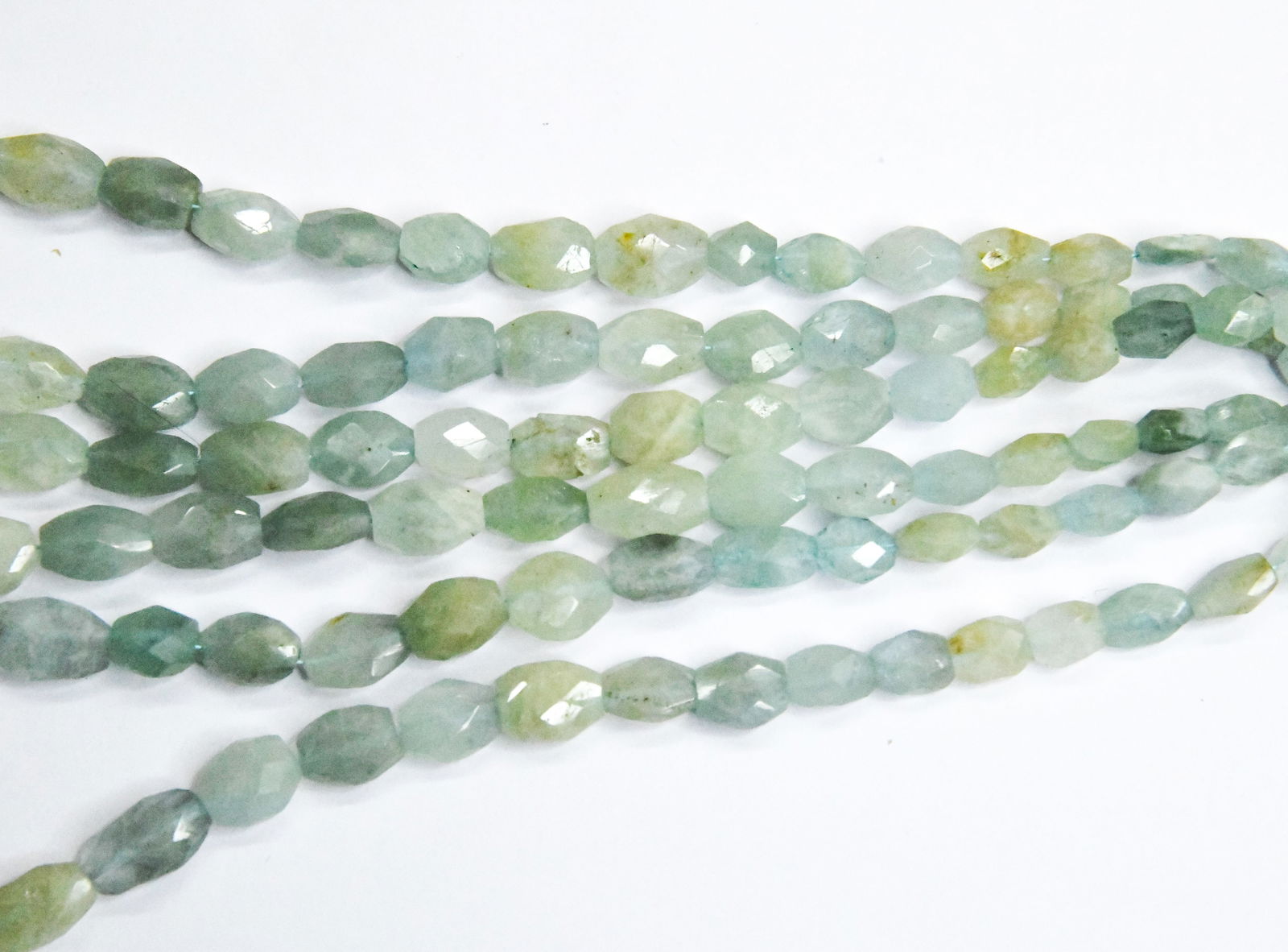 NATURAL AQUAMARINE BEADS FACETED OVAL 5X6 - 8X12 MM, 14" STRAND (1 of 1)