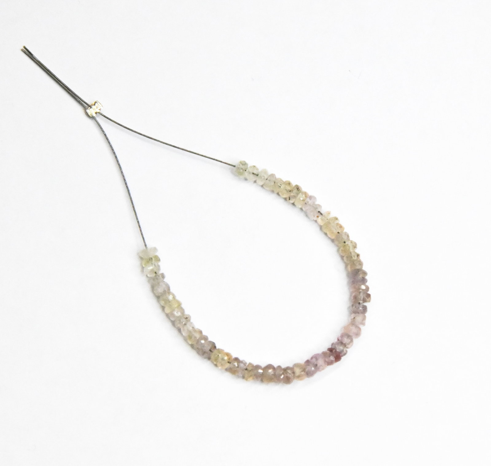 NATURAL MULTI SAPPHIRE BEADS FACETED RONDELLE 2.5 - 3 MM, 53 PCS: These are natural, earth mined and hand crafted with precision. Stone: Sapphire, Stone Shape: Faceted Rondelle, Stone Size: 2.5 - 3 mm, Width: 1 - 2 mm, Weight: approx. 7 carats. The photographs are g