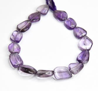 NATURAL AMETHYST BEADS TUMBLE 10X10 - 10X15 MM, 7.5" STRAND: These are natural, earth mined and hand crafted with precision. Stone: Amethyst, Stone Shape: Tumble, Stone Size: 10x10.5 - 10x15 mm, Width: 3.5 - 5 mm, Weight: approx. 70 carats. The photographs are