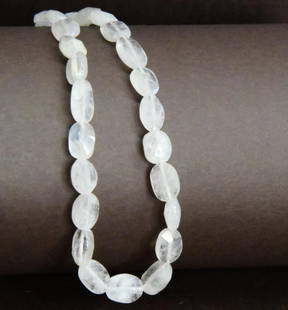 NATURAL RAINBOW MOONSTONE BEADS FACETED OVAL 6X7.5 - 6X9 MM, 12.5'' STRAND: These are natural, earth mined and hand crafted with precision. Stone: Rainbow Moonstone, Stone Shape: Faceted Oval, Stone Size: 6x7.5 - 6x9 mm, Width: 3 - 4 mm, Weight: approx. 58 carats. The photogr