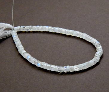 NATURAL RAINBOW MOONSTONE BEADS TYRE 4.5 - 5 MM, 8.5'' STRAND: These are natural, earth mined and hand crafted with precision. Stone: Rainbow Moonstone, Stone Shape: Tyre, Stone Size: 4.5 - 5 mm, Width: 2.5 - 4 mm, Weight: approx. 53 carats. The photographs are g