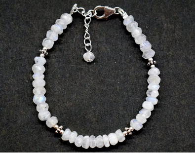 6.5 - 7.5" SOLID 925 SILVER BRACELET NATURAL RAINBOW MOONSTONE BEADS: These are natural, earth mined and hand crafted with precision. Stone: Rainbow Moonstone, Shape: Faceted Rondelle, Size: 5 mm, Width - 2 - 3 mm, Length: 6.5 - 7.5", Weight: approx. 35 carats. The phot