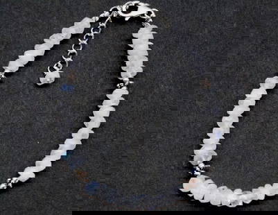 6.5 - 7.5" SOLID 925 SILVER BRACELET NATURAL RAINBOW MOONSTONE RONDELLE: These are natural, earth mined and hand crafted with precision. Stone: Moonstone, Stone Shape: Faceted Rondelle, Stone Size: 5 mm, Width: 2.5 - 3 mm, Length: 6.5 - 7.5", Weight: approx. 36 carats. The