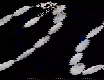 7 - 8" SOLID 925 SILVER BRACELET NATURAL RAINBOW MOONSTONE BEADS OVAL: These are natural, earth mined and hand crafted with precision. Stone: Moonstone, Stone Shape: Oval, Stone Size: 8x9.5 - 8.5x13 mm, Width: 4 - 6 mm, Length: 7 - 8", Weight: approx. 58 carats. The phot