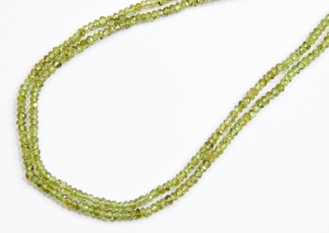 NATURAL PERIDOT BEADS FACETED RONDELLE 3 MM, 13" STRAND (2 LINES): These are natural, earth mined and hand crafted with precision. Stone: Peridot, Stone Shape: Faceted Rondelle, Stone Size: 3 mm, Width: 1.5 - 2 mm, Weight: 28 carats. The photographs are generally enl