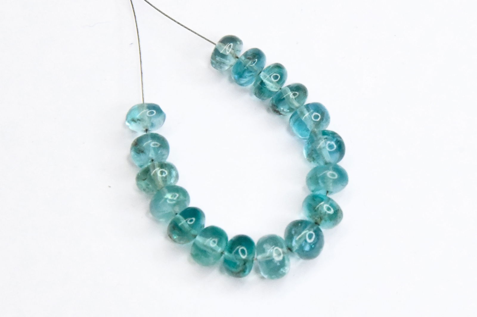 NATURAL APATITE BEADS RONDELLE 6.5 - 7 MM 17 PCS: These are natural, earth mined and hand crafted with precision. Stone: Apatite, Stone Shape: Rondelle, Stone Size: 6.5 - 7 mm, Width: 4 - 5 mm, Weight: approx. 39.50 carats. The photographs are genera