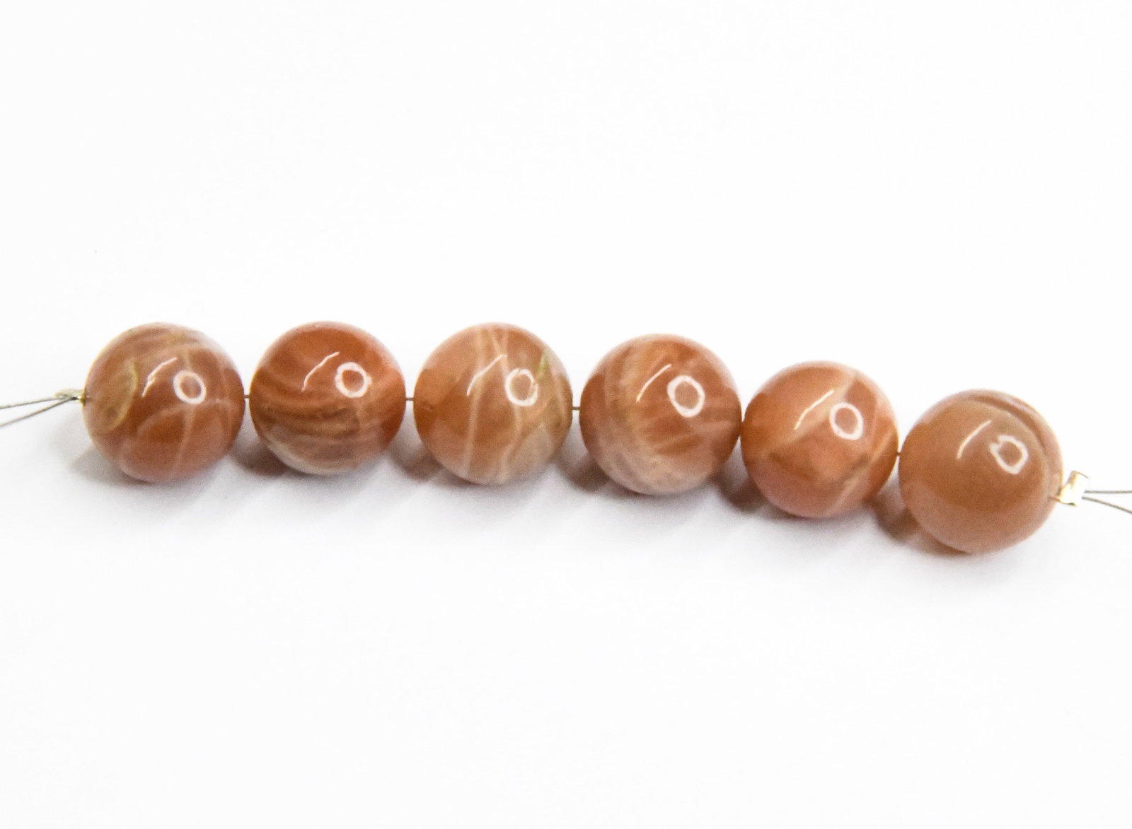 NATURAL PEACH MOONSTONE BEADS ROUND 11.5 - 12 MM, 6 PCS: These are natural, earth mined and hand crafted with precision. Stone: Peach Moonstone, Stone Shape: Round, Stone Size: 11.5 - 12 mm, Weight: approx. 66 carats. The photographs are generally enlarged 