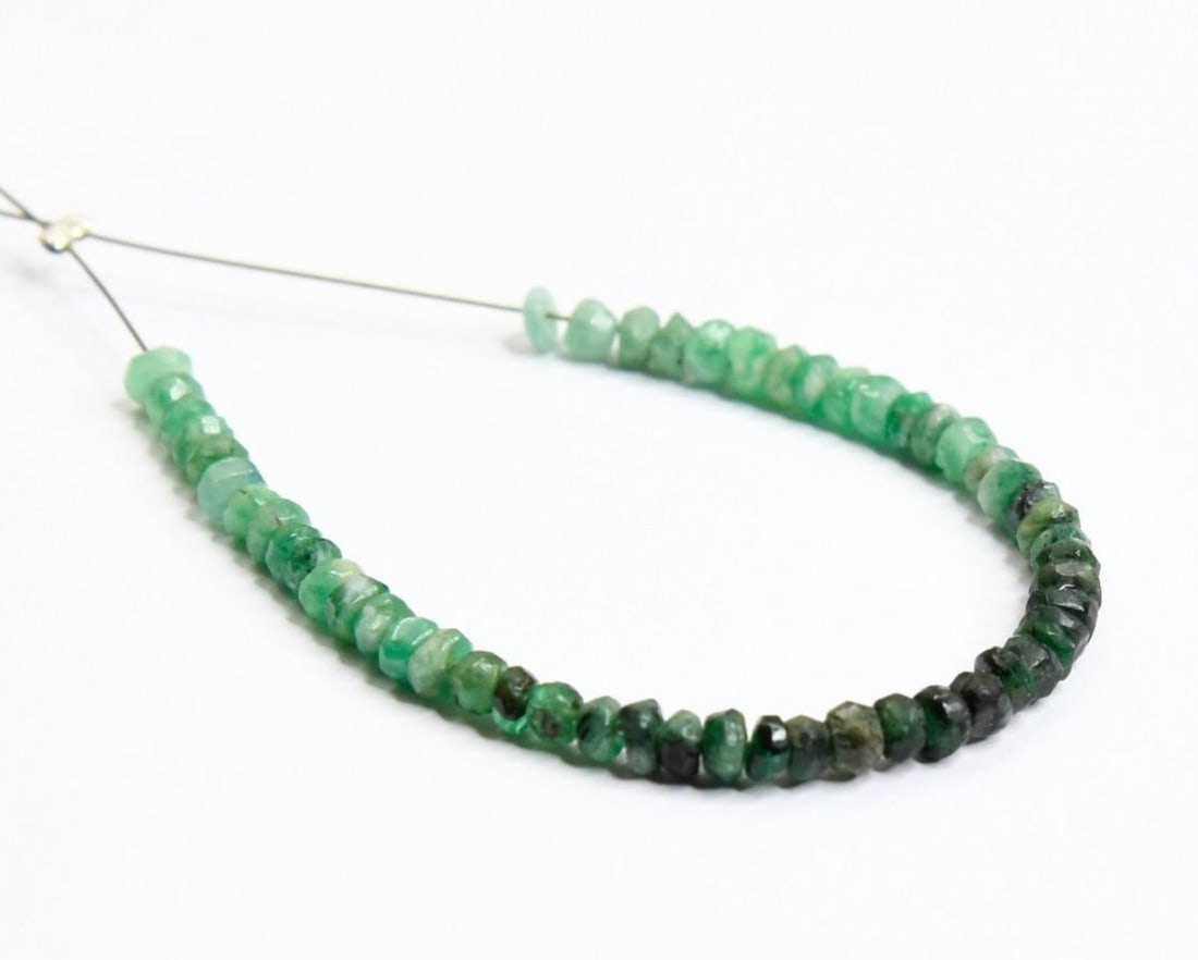 NATURAL EMERALD BEADS FACETED RONDELLE 2.5 - 3 MM 53 PCS: These are natural, earth mined and hand crafted with precision. Stone: Emerald, Stone Shape: Faceted Rondelle, Stone Size: 2.5 - 3 mm, Width: 1 - 2 mm, Weight: approx. 6 carats. The photographs are ge