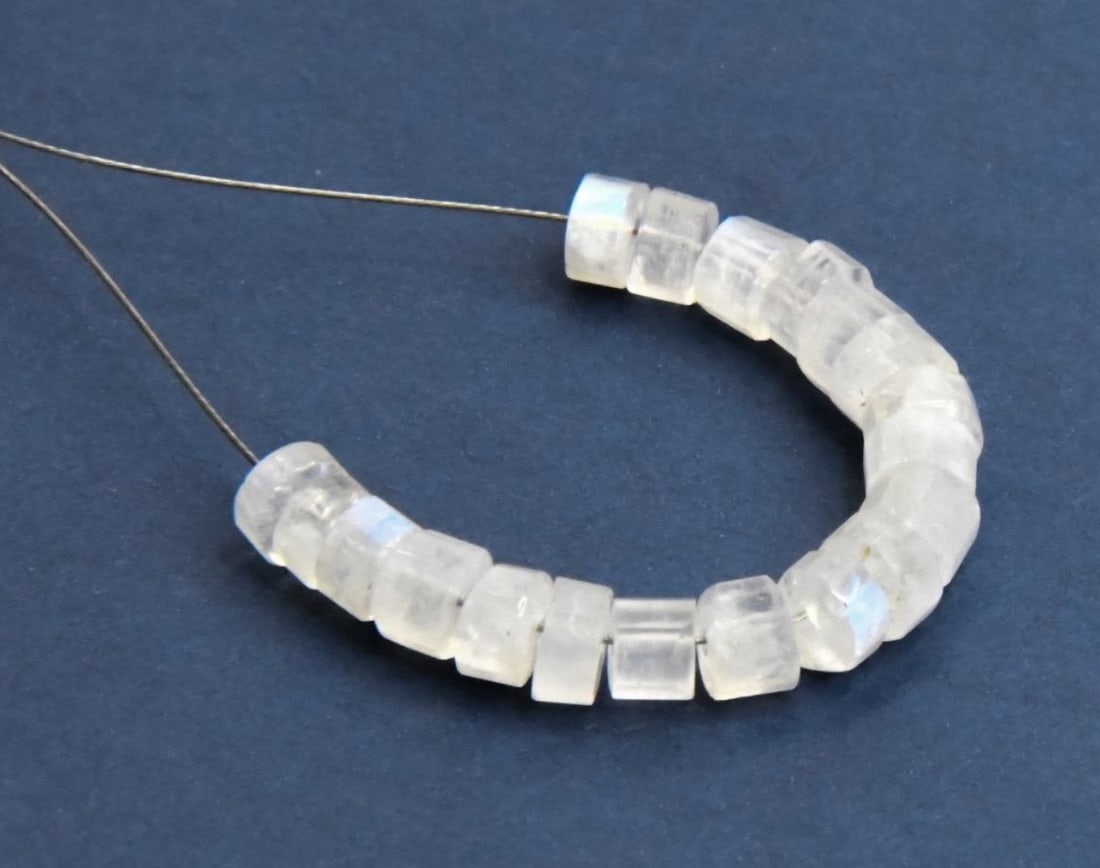 NATURAL RAINBOW MOONSTONE BEADS FACETED TYRE 19 PCS, 4.5 - 5 MM (2 TASSELS): These are natural, earth mined and hand crafted with precision. Stone: Rainbow Moonstone, Stone Shape: Faceted Tyre, Stone Size: 4.5 - 5 mm, Width: 2.5 - 3.5 mm, Weight: approx. 13 carats. The photogr