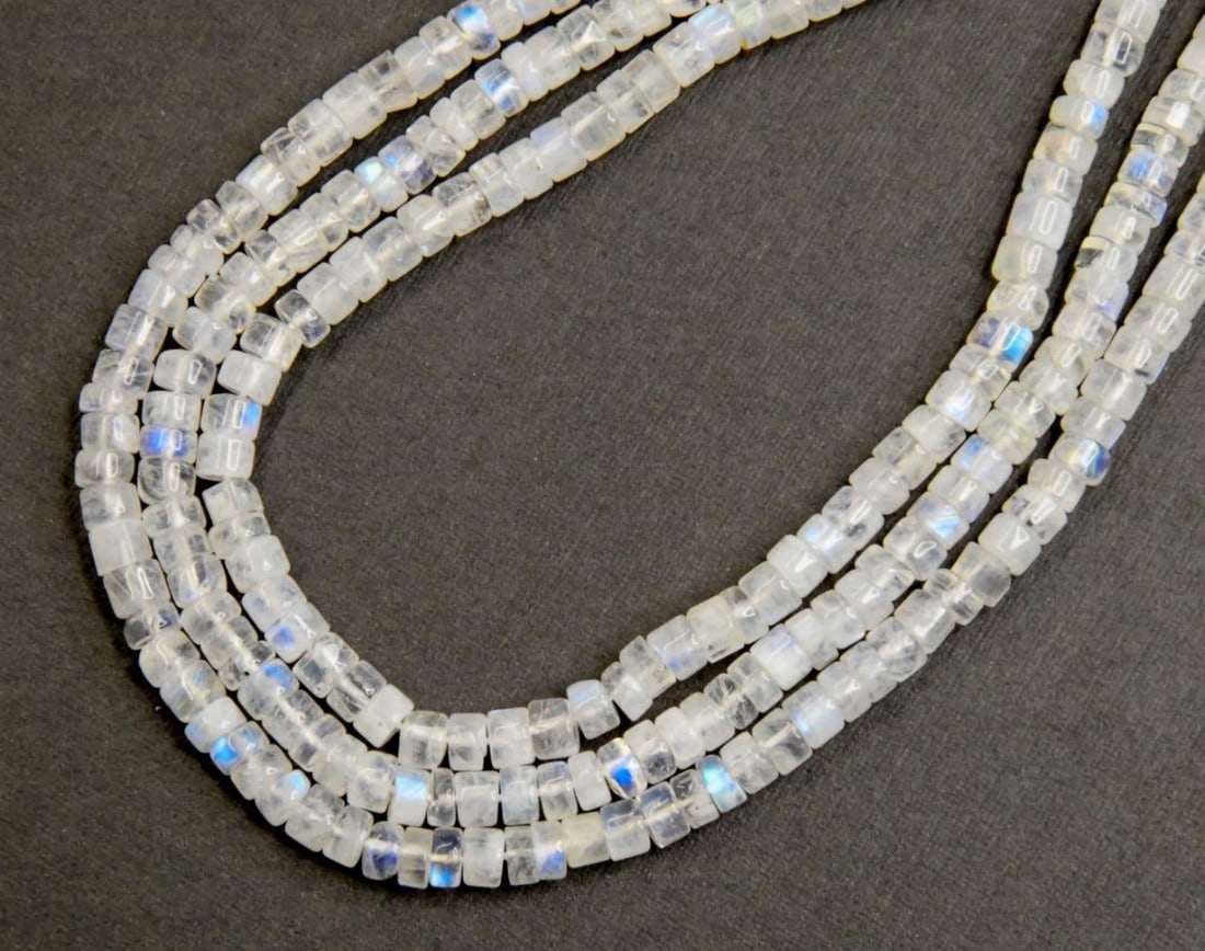 NATURAL RAINBOW MOONSTONE BEADS TYRE 13"STRAND, 4.5 - 5 MM: These are natural, earth mined and hand crafted with precision. Stone: Rainbow Moonstone, Stone Shape: Tyre, Stone Size: 4.5 - 5 mm, Width: 2.5 - 3.5 mm, Weight: approx. 76 carats. The photographs are