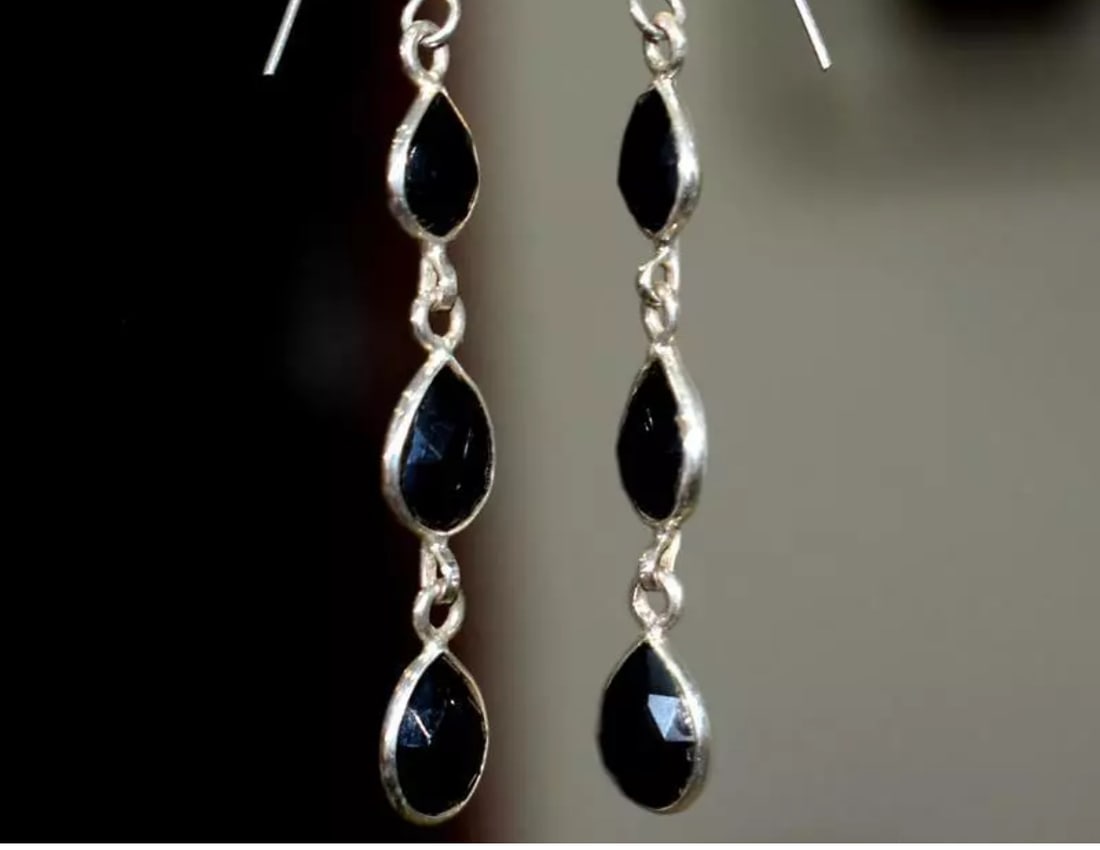 SOLID 925 STERLING SILVER EARRINGS - NATURAL BLACK SPINEL PEAR: These are natural, earth mined and hand crafted with precision. Stone: Spinel, Stone Shape: Faceted Pear, Stone Size: 6x8 - 7x9 mm, Width - 3 - 4mm, Length: 2 1/8", Weight: approx. 14 carats. The phot