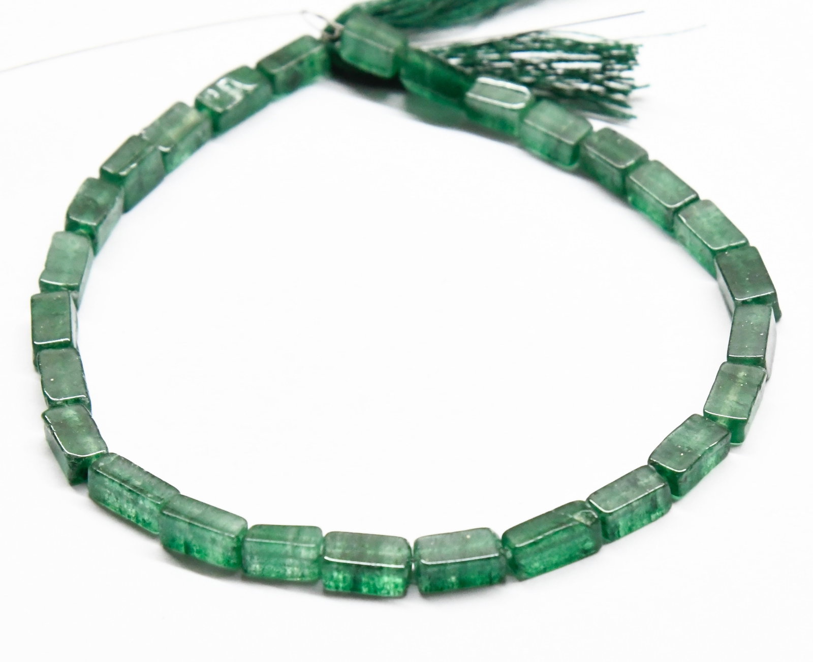 NATURAL GREEN AVENTURINE BEADS CUBE 4X6 - 4X8 MM, 8.5" STRAND: These are natural, earth mined and hand crafted with precision. Stone: Green Aventurine, Stone Shape: Cube, Stone Size: 4.5x6.5 - 4.5x8.5 mm, Width: 3.5 - 4 mm, Weight: approx. 44 carats. The photogra