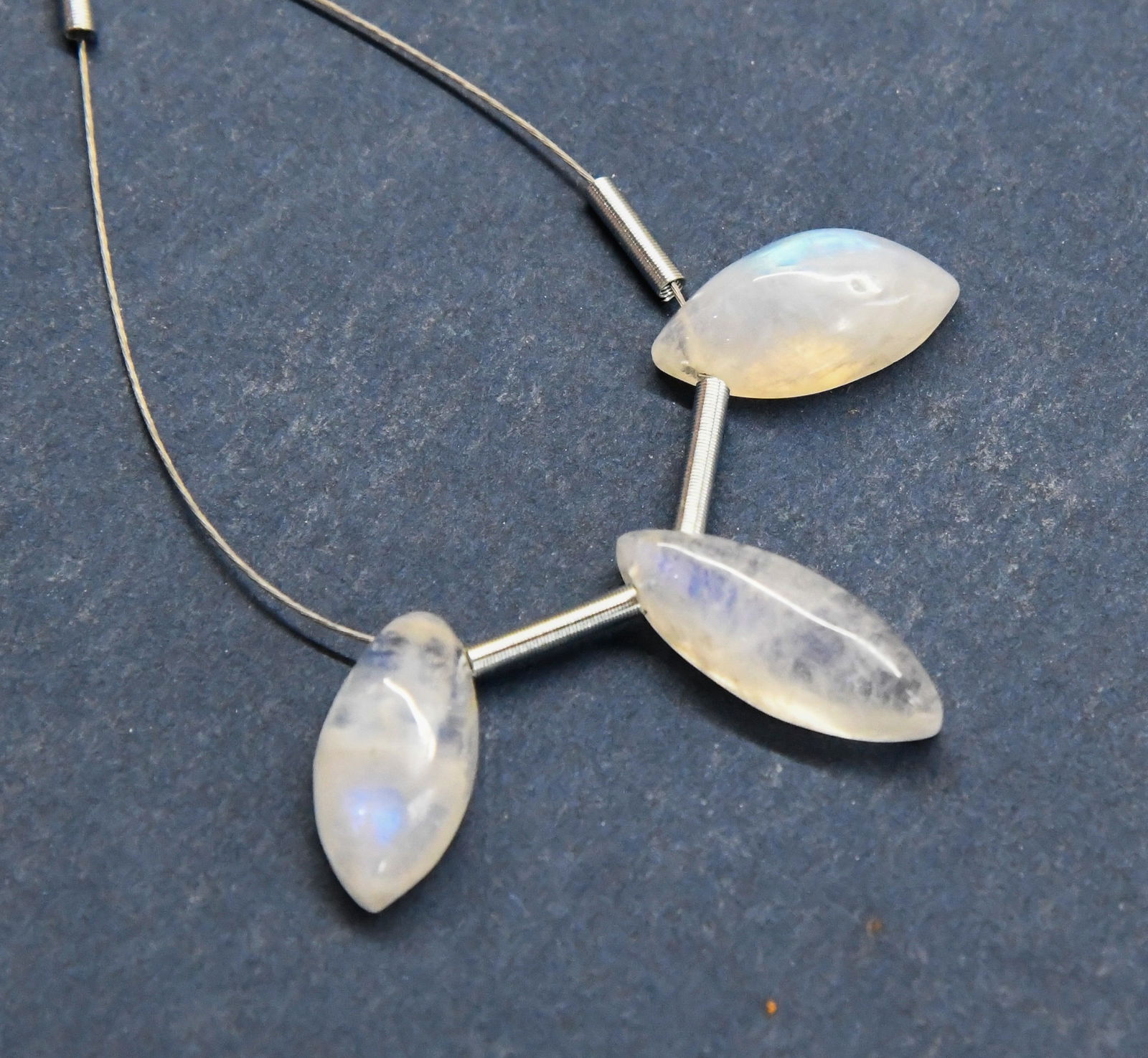 NATURAL RAINBOW MOONSTONE BEADS MARQUISE CABOCHON 7X14 - 6X16.5 MM, 3 PCS: These are natural, earth mined and hand crafted with precision. Stone: Rainbow Moonstone, Stone Shape: Marquise Cabochon, Stone Size: 7x14 - 6x16.5 mm, Weight: approx. 12 carats. The photographs are g