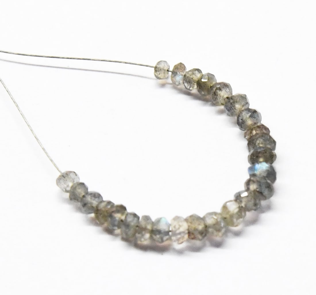 NATURAL LABRADORITE BEADS FACETED RONDELLE 3 - 3.5 MM, 25 PCS: These are natural, earth mined and hand crafted with precision. Stone: Labradorite, Stone Shape: Faceted Rondelle, Stone Size: 3 - 3.5 mm, Width: 3 - 4 mm, Weight: approx. 5 carats. The photographs ar