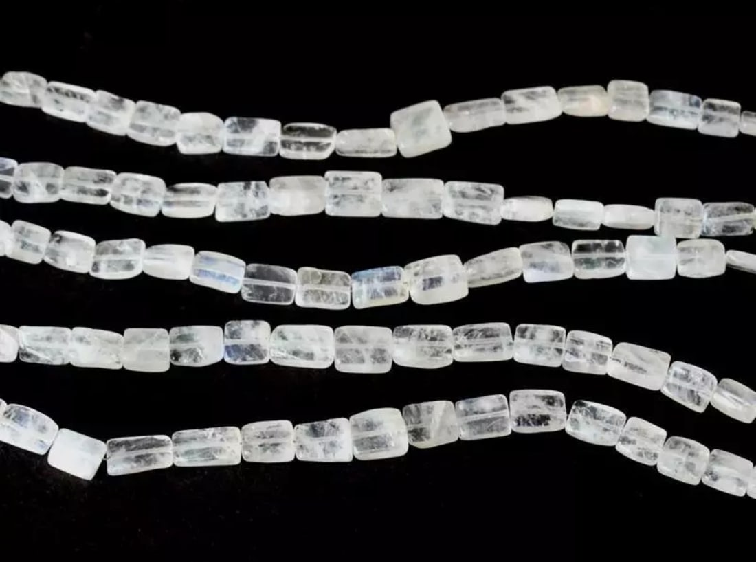 7" STRAND NATURAL RAINBOW MOONSTONE BEADS CUBE 5.5X7 - 7X10 MM (2 LINES): These are natural, earth mined and hand crafted with precision. Stone: Moonstone, Stone Shape: Cube, Stone Size: 5.5x7 - 7x10mm, Width - 2 - 4mm, Length: 7" line, Weight: approx. 46 carats. The photog
