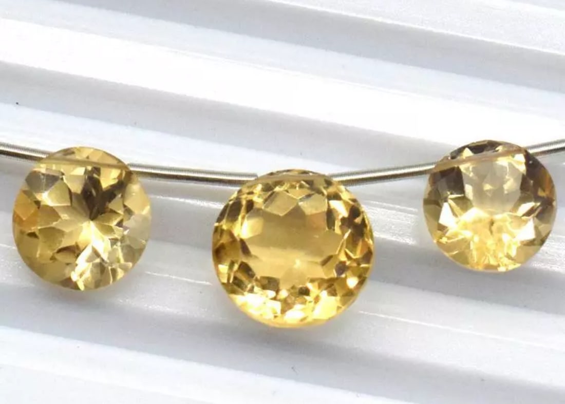 NATURAL CITRINE BEADS FACETED ROUND 10 - 11 MM 3 PCS: These are natural, earth mined and hand crafted with precision. Stone: Citrine, Shape: Faceted Round, Size: 10 - 11mm, Width - 6 - 8 mm, Weight: approx. 12 carats. The photographs are enlarged to show