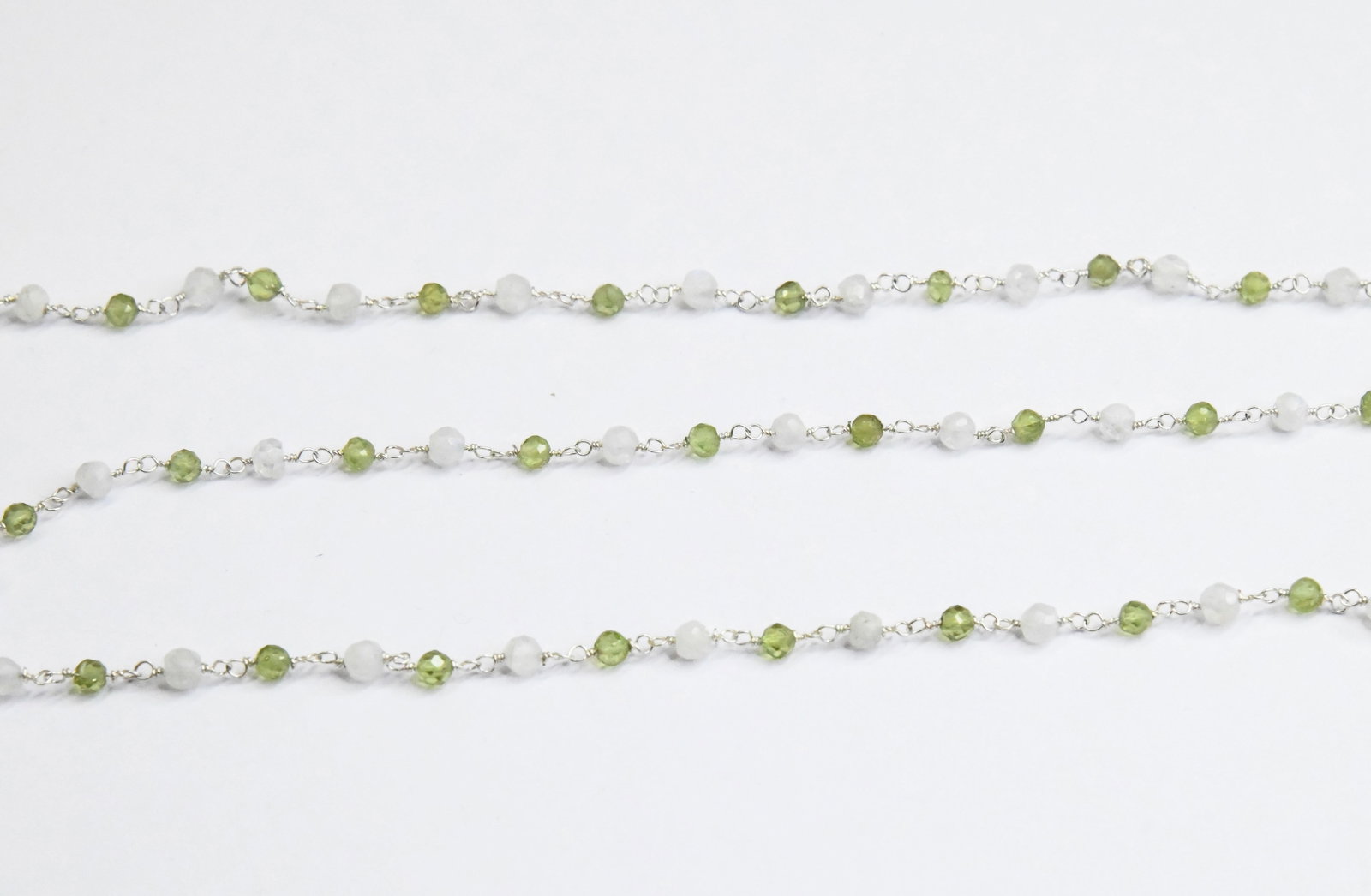SOLID 925 SILVER LINK CHAIN - 1 FOOT - PERIDOT MOONSTONE GEMSTONE BEADS: These are natural, earth mined and hand crafted with precision. Stone: Rainbow Moonstone/Peridot, Stone Shape: Faceted Round, Stone Size: 3.5 - 4 mm, Length: 12". The photographs are enlarged to show