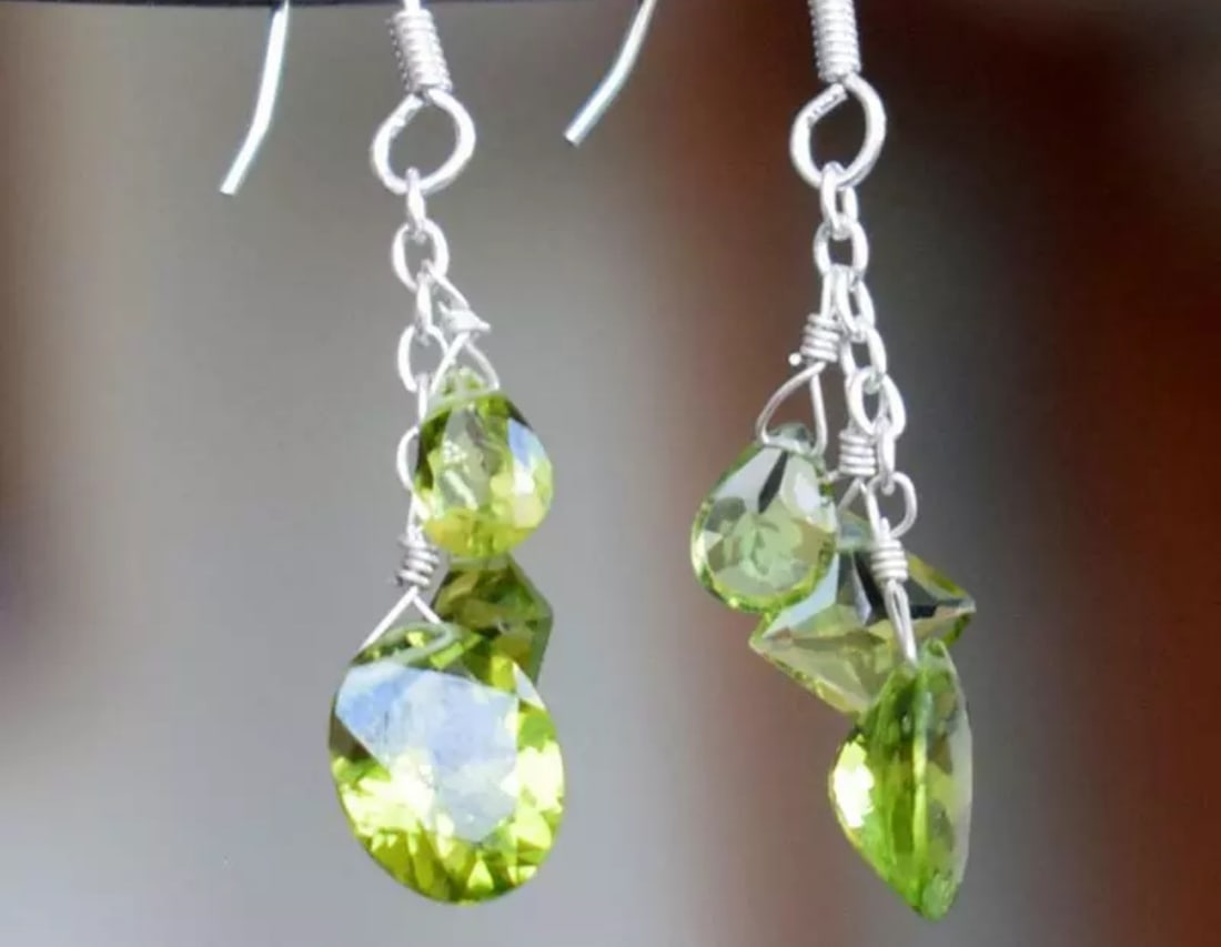 SOLID 925 STERLING SILVER EARRINGS - NATURAL FINE PERIDOT BEADS: These are natural, earth mined and hand crafted with precision. Stone: Peridot, Stone Shape: Faceted Mix Shape, Stone Size: 5x7 - 8x10mm, Width - 3 - 4.5mm, Weight: approx. 11.50 carats. The photograp