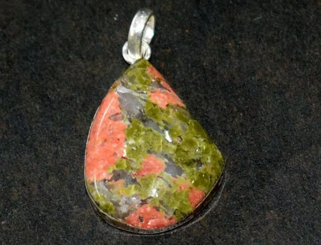 SOLID 925 STERLING SILVER PENDANT - NATURAL UNAKITE JASPER: These are natural, earth mined and hand crafted with precision. Stone: Unakite Jasper, Shape: Fancy, Size: 19x25 mm, Width - 5.5 mm, Weight: approx. 25 carats. The photographs are enlarged to show the