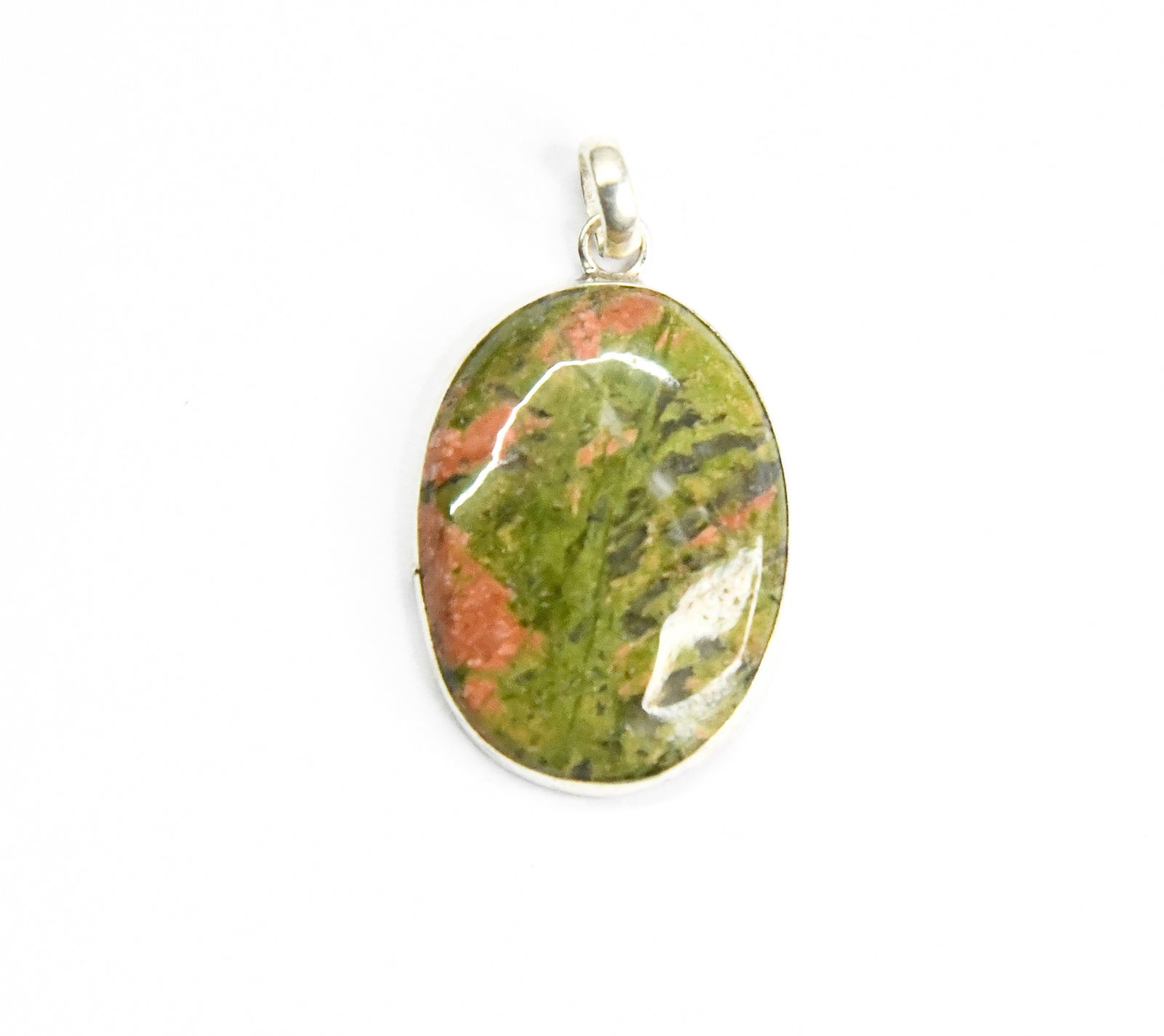 SOLID 925 STERLING SILVER PENDANT - NATURAL UNAKITE JASPER OVAL: These are natural, earth mined and hand crafted with precision. Stone: Unakite Jasper, Shape: Oval, Size: 20x27 mm, Width - 4.5 mm, Weight: approx. 28 carats. The photographs are enlarged to show the