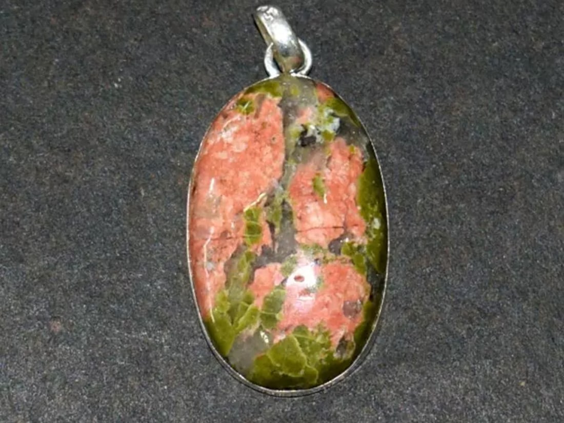 SOLID 925 STERLING SILVER PENDANT - NATURAL UNAKITE JASPER OVAL: These are natural, earth mined and hand crafted with precision. Stone: Unakite Jasper, Shape: Oval, Size: 16x26 mm, Width - 6 mm, Weight: approx. 28 carats. The photographs are enlarged to show the cl