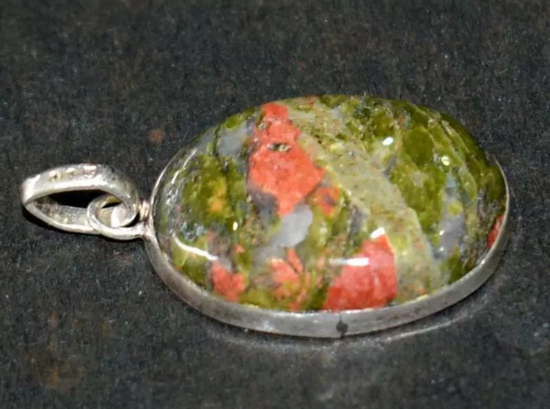 SOLID 925 STERLING SILVER PENDANT - NATURAL UNAKITE JASPER OVAL: These are natural, earth mined and hand crafted with precision. Stone: Unakite Jasper, Shape: Oval, Size: 17x23 mm, Width - 5.5 mm, Weight: approx. 25 carats. The photographs are enlarged to show the