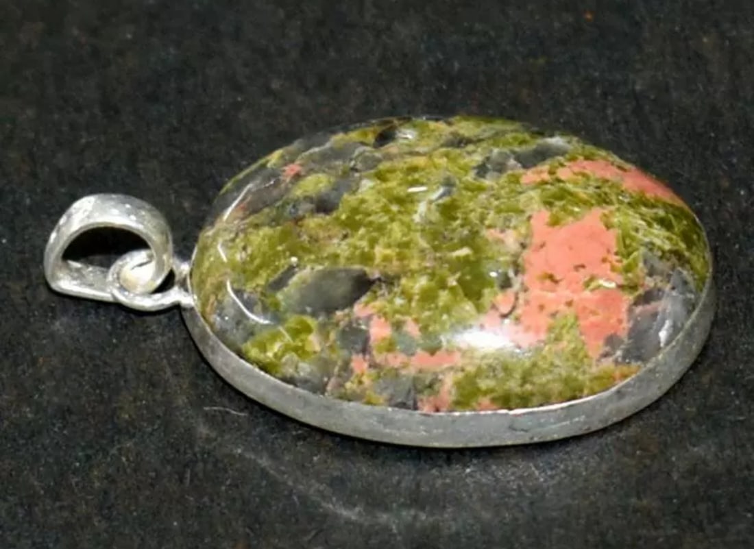 SOLID 925 STERLING SILVER PENDANT - NATURAL UNAKITE JASPER OVAL: These are natural, earth mined and hand crafted with precision. Stone: Unakite Jasper, Shape: Oval, Size: 19x25 mm, Width - 6.5 mm, Weight: approx. 33 carats. The photographs are enlarged to show the