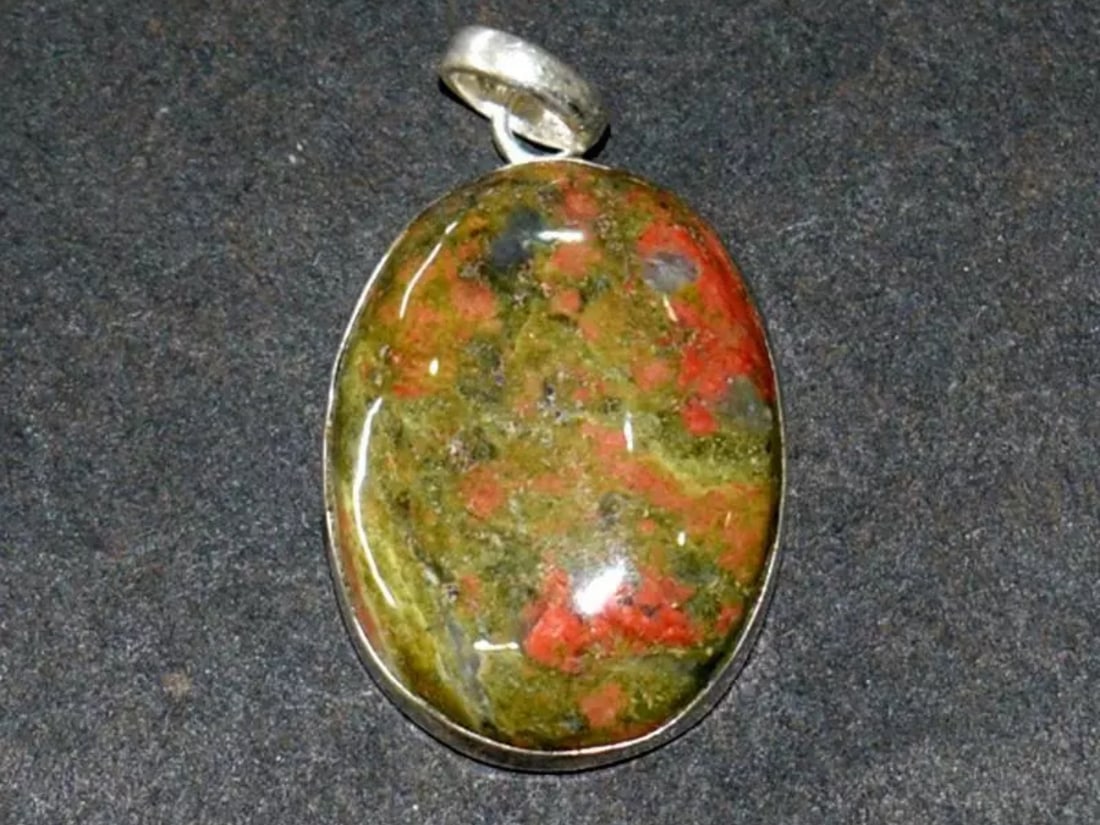 SOLID 925 STERLING SILVER PENDANT - NATURAL UNAKITE JASPER OVAL: These are natural, earth mined and hand crafted with precision. Stone: Unakite Jasper, Shape: Oval, Size: 17x23 mm, Width - 6 mm, Weight: approx. 29 carats. The photographs are enlarged to show the cl