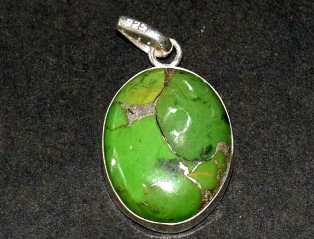 SOLID 925 STERLING SILVER PENDANT - GREEN COPPER TURQUOISE OVAL 1 1/4": These are natural, earth mined and hand crafted with precision. Stone: Green Copper Turquoise, Shape: Oval, Size: 16x21 mm, Width - 5.5 mm, Length: 1 1/4", Weight: approx. 21 carats. The photographs a