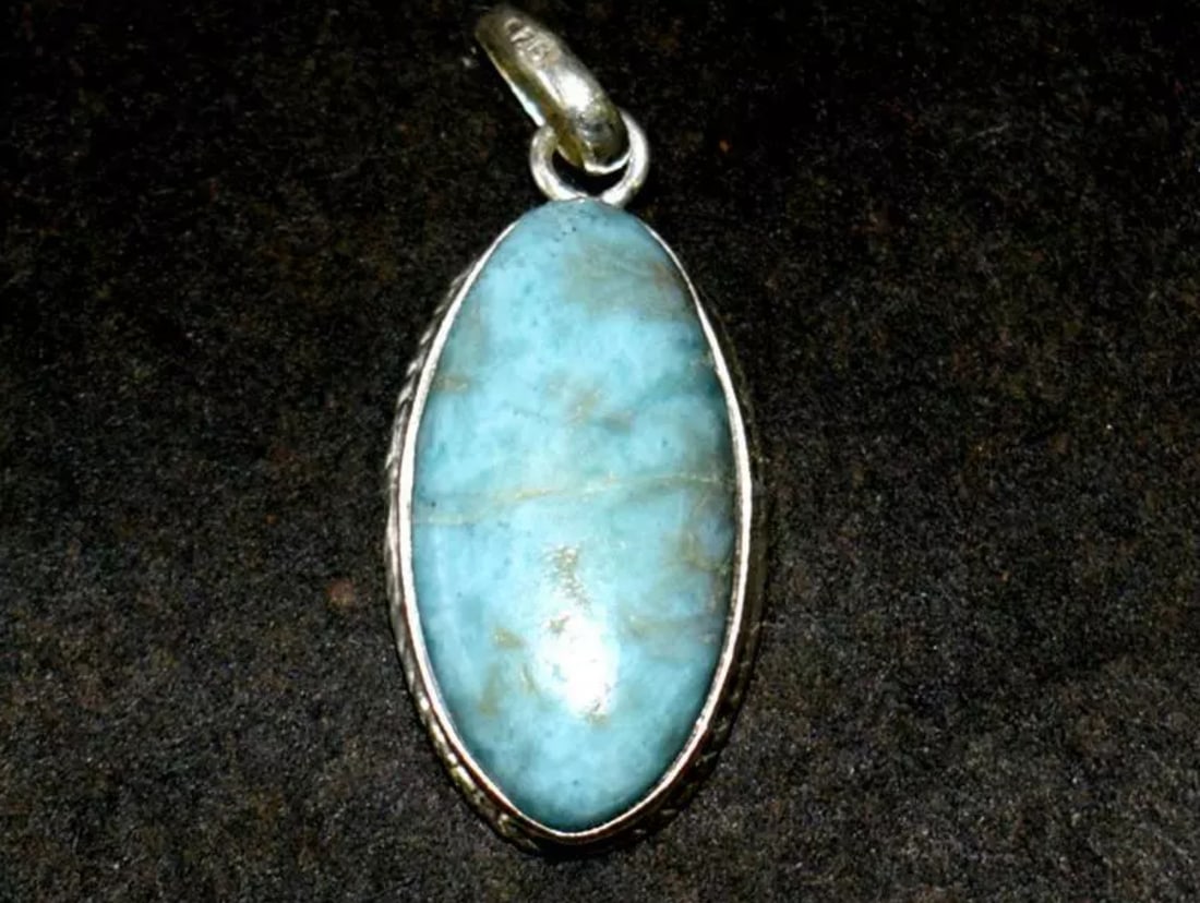 SOLID 925 STERLING SILVER PENDANT - NATURAL LARIMAR OVAL: These are natural, earth mined and hand crafted with precision. Stone: Larimar, Shape: Oval, Size: 12x23 mm, Width: 6.5 mm, Length: 1 3/8", Weight: approx. 26 carats. The photographs are enlarged to s